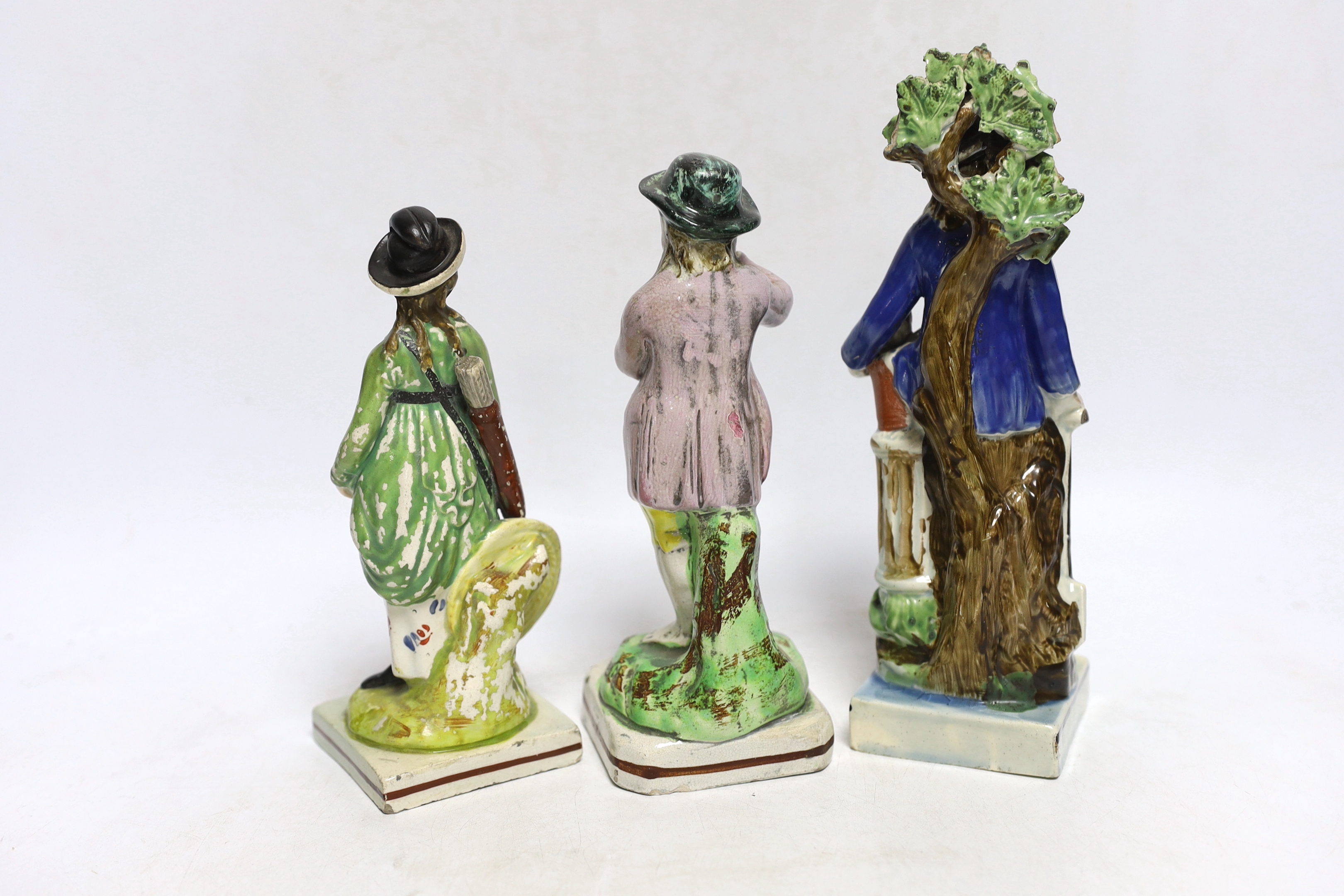 Three Staffordshire pearlware figures of a boy with grapes, a lady archer and a 'Gardener', largest 22cm high